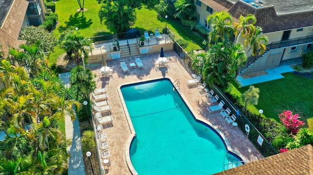 view of swimming pool featuring a patio area