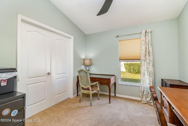 carpeted office featuring ceiling fan