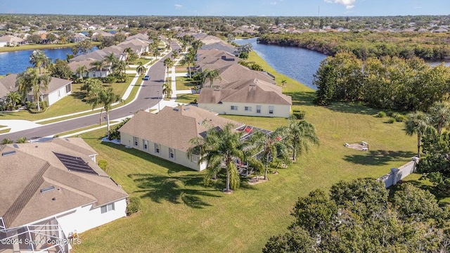 drone / aerial view with a water view