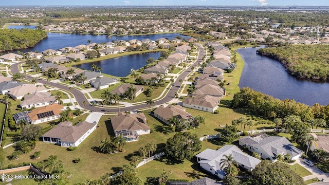 drone / aerial view featuring a water view