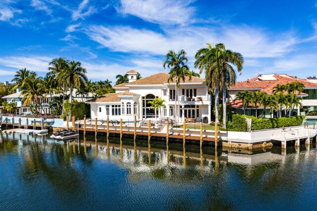 mediterranean / spanish-style house featuring a balcony