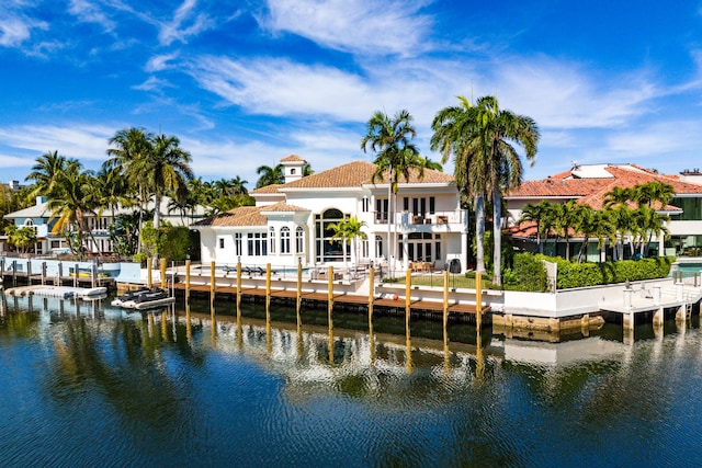 back of house featuring a water view