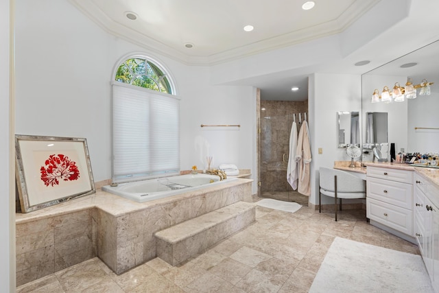 bathroom featuring vanity, crown molding, and independent shower and bath