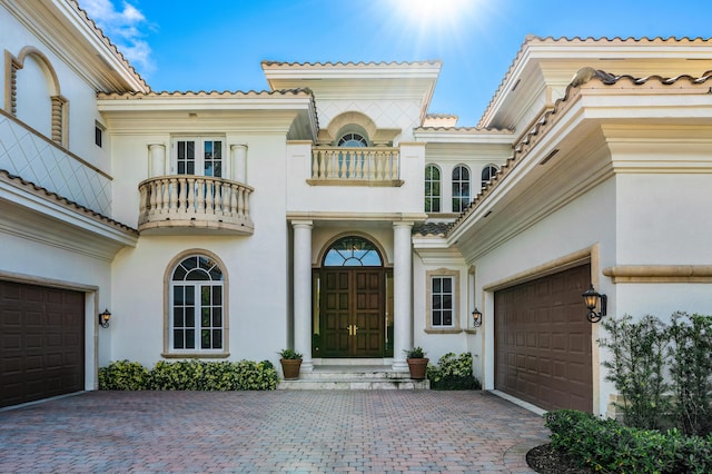 doorway to property with a balcony