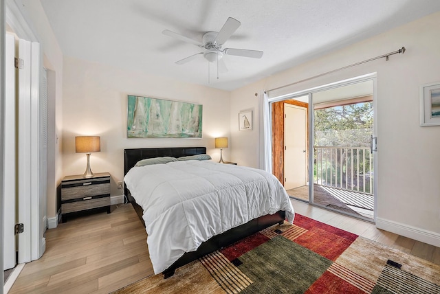 bedroom featuring ceiling fan, access to outside, and light hardwood / wood-style floors