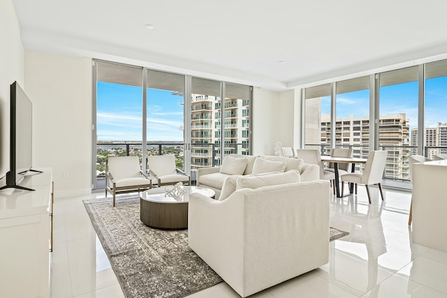 living room featuring a wall of windows, a wealth of natural light, and light tile patterned floors