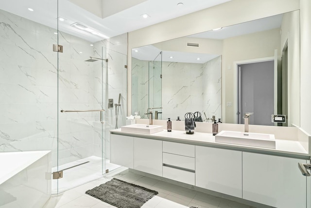 bathroom with vanity, plus walk in shower, and tile walls