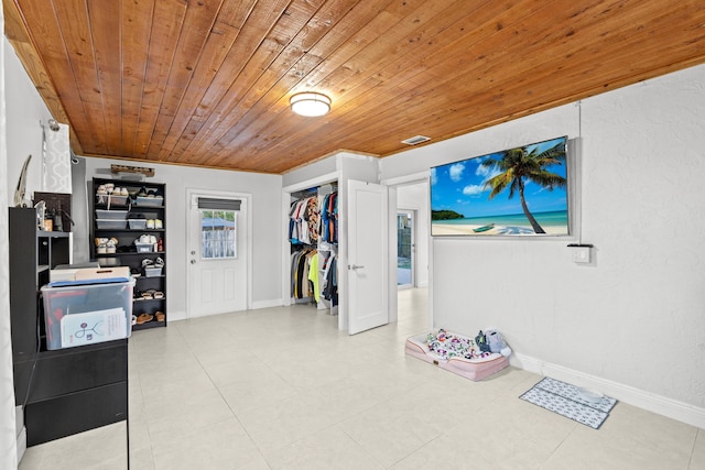 interior space featuring wood ceiling