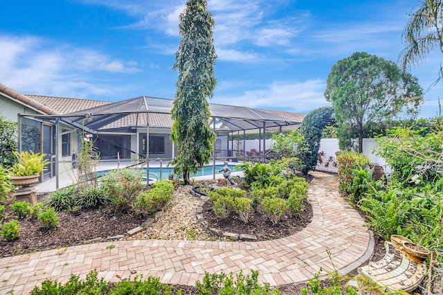 view of yard featuring a lanai