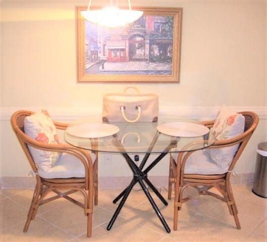 dining area featuring tile patterned floors