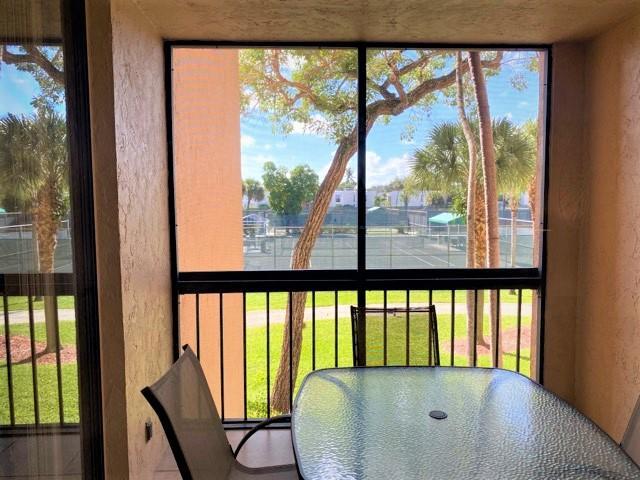 unfurnished sunroom with a healthy amount of sunlight