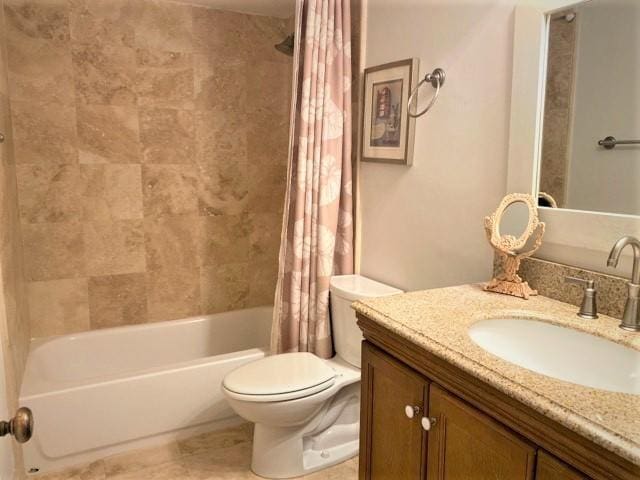 full bathroom with shower / bathtub combination with curtain, vanity, and toilet