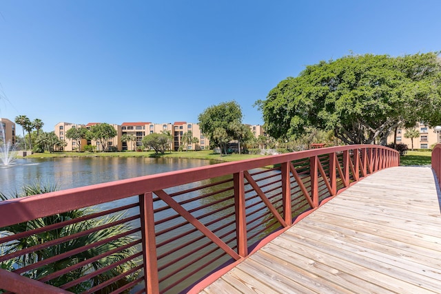 dock area with a water view