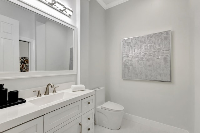 bathroom featuring toilet and vanity