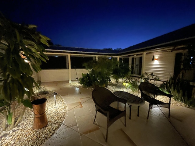 view of patio at twilight