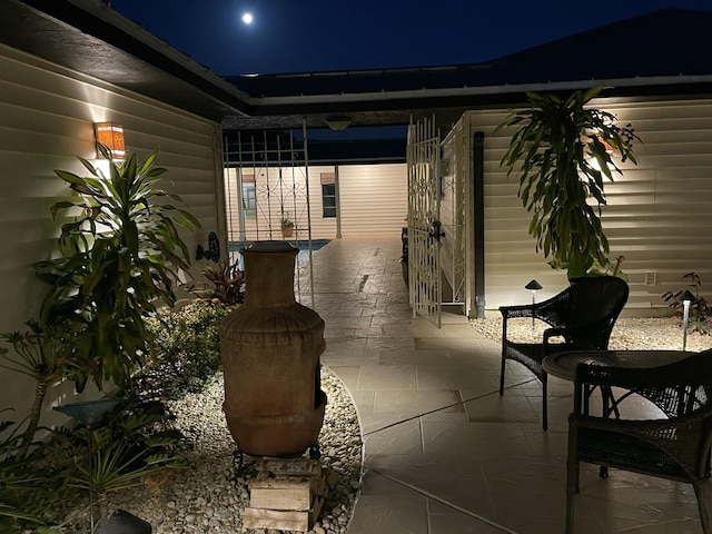 view of patio at night