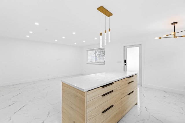 interior space featuring light brown cabinetry, decorative light fixtures, a chandelier, a center island, and light stone countertops