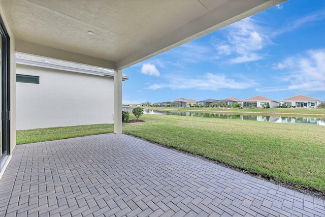 view of patio / terrace featuring a water view