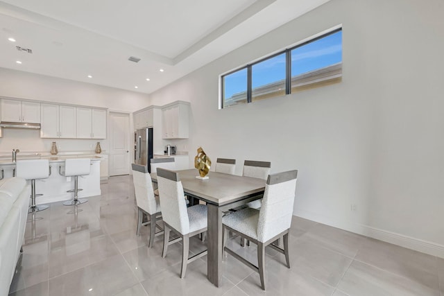 dining room with light tile patterned floors