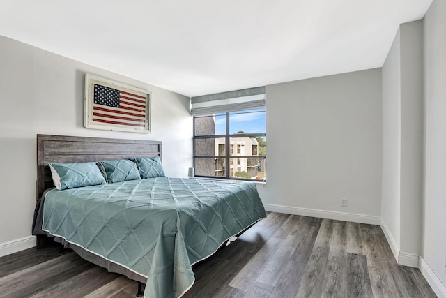 bedroom featuring dark hardwood / wood-style floors