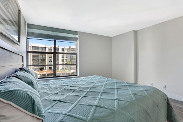 bedroom featuring wood-type flooring