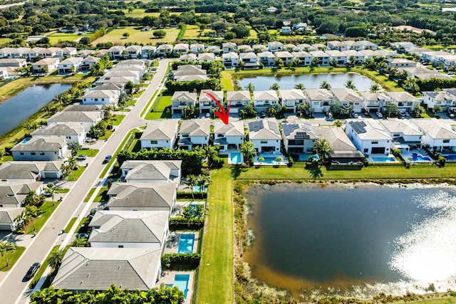 drone / aerial view with a water view