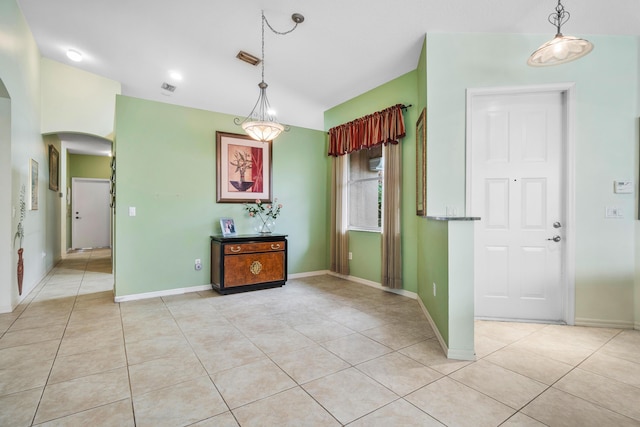 interior space with light tile patterned flooring