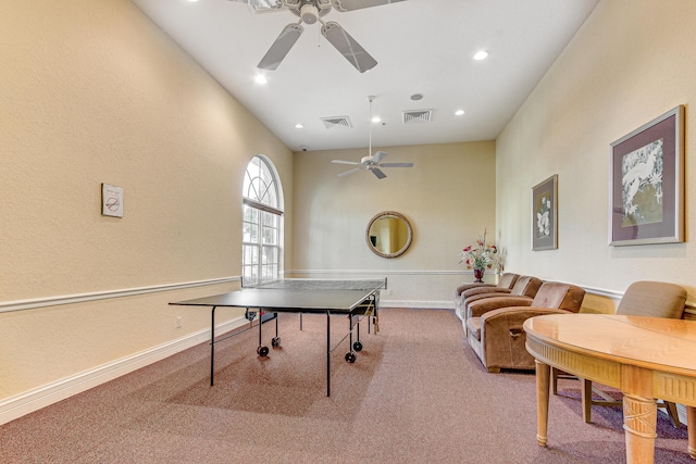 recreation room featuring carpet and ceiling fan