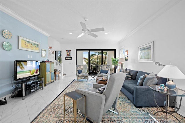 living room featuring ornamental molding and ceiling fan