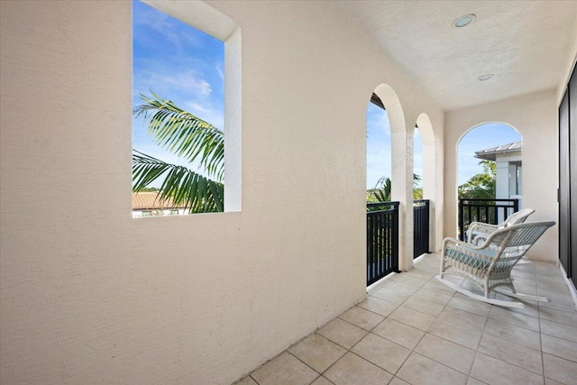 view of patio / terrace with a balcony