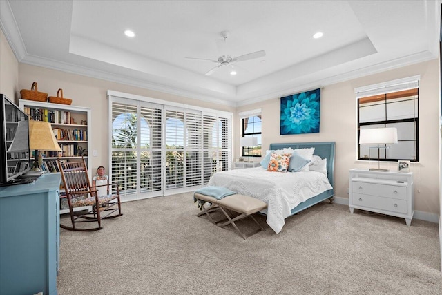 carpeted bedroom with crown molding, access to outside, a raised ceiling, and ceiling fan