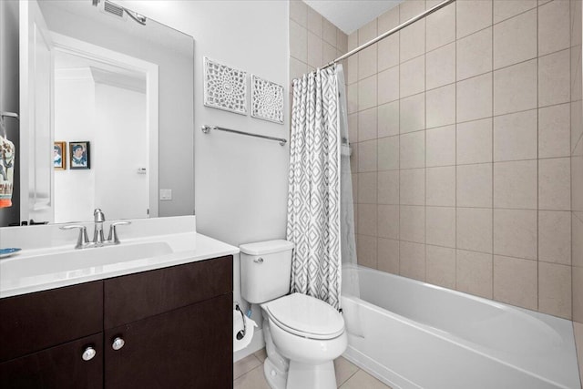 full bathroom featuring tile patterned floors, toilet, shower / tub combo, and vanity