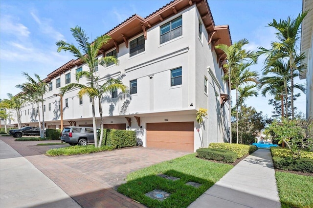 view of building exterior with a garage