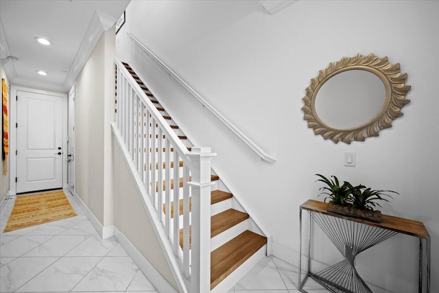 staircase with crown molding