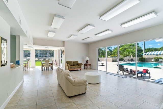 living room with light tile patterned floors