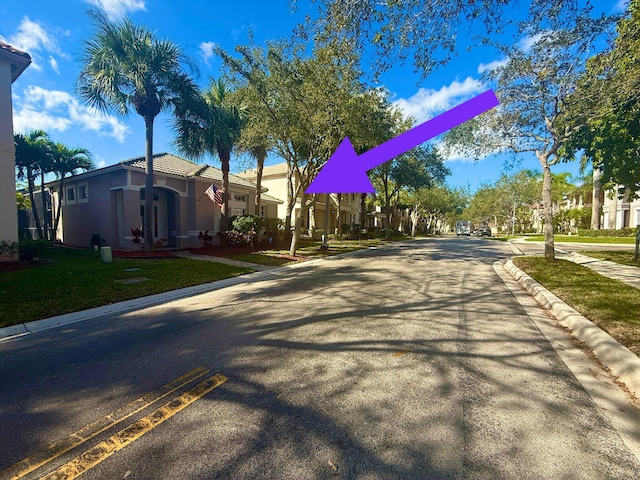 view of street with curbs and sidewalks