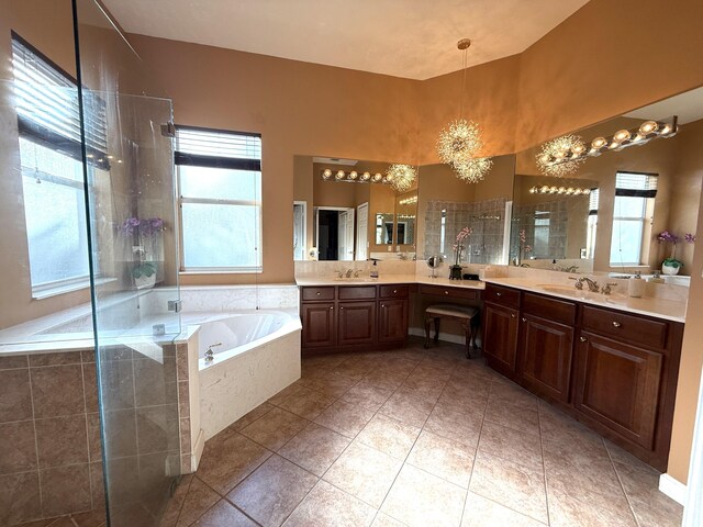 kitchen featuring baseboards, visible vents, a breakfast bar, stainless steel appliances, and a textured ceiling