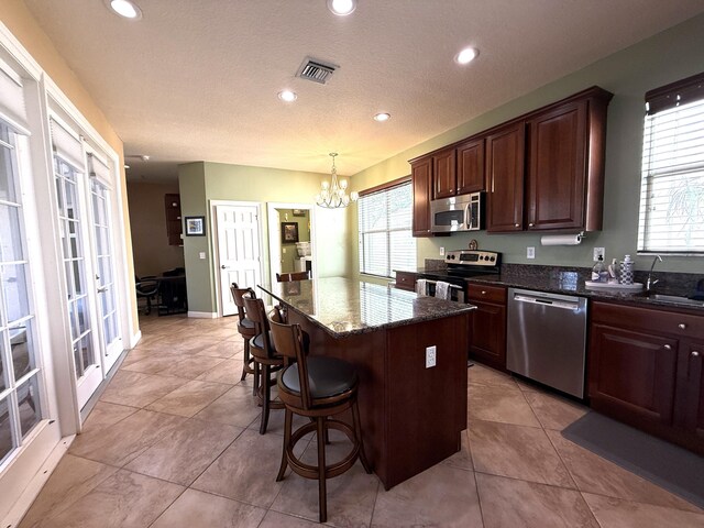 bedroom with dark wood finished floors and baseboards