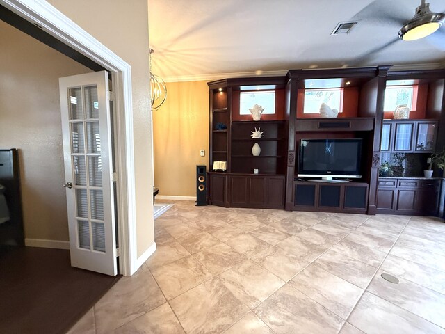 kitchen with a kitchen bar, baseboards, visible vents, and appliances with stainless steel finishes