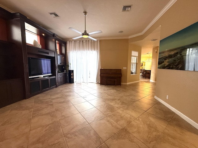 unfurnished living room with visible vents, baseboards, ornamental molding, and a ceiling fan