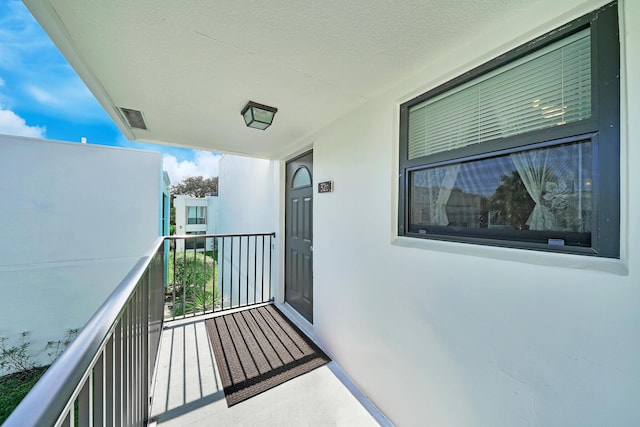 balcony featuring visible vents