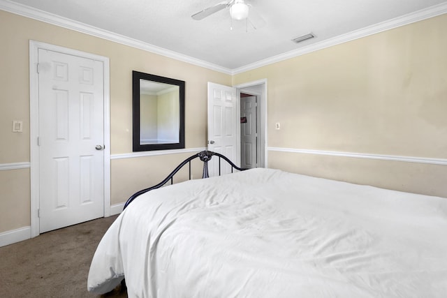 bedroom featuring crown molding, ceiling fan, and carpet flooring