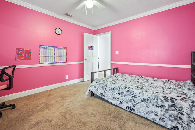 carpeted bedroom featuring crown molding, a textured ceiling, and ceiling fan