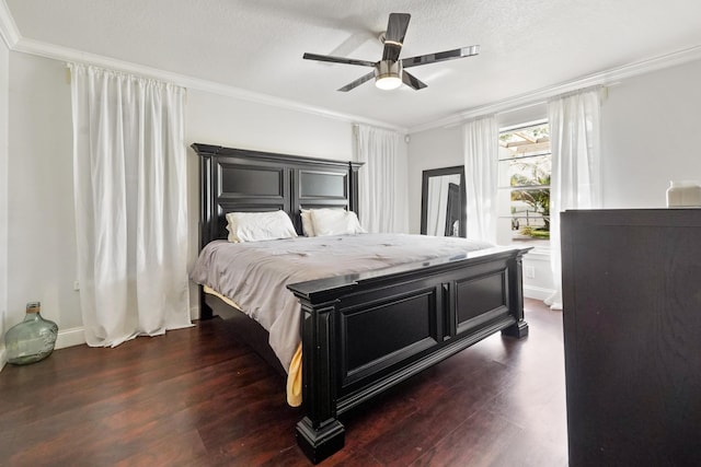 bedroom with crown molding, ceiling fan, dark wood-type flooring, and a textured ceiling