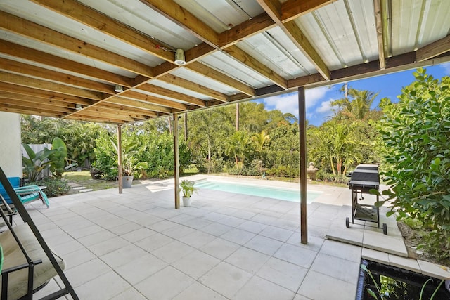 view of patio featuring a grill