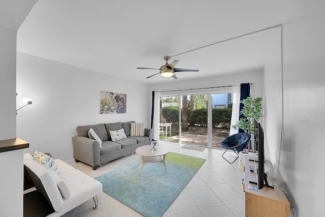 tiled living room featuring ceiling fan