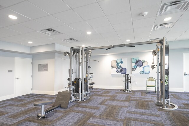 gym featuring light hardwood / wood-style floors