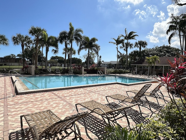 view of pool featuring a patio area