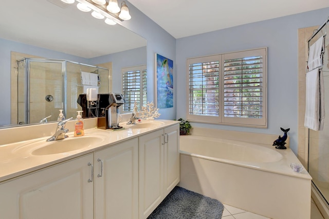 bathroom featuring vanity, independent shower and bath, and tile patterned flooring