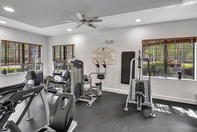 exercise room with ceiling fan